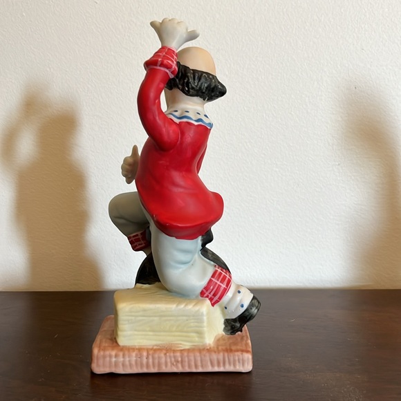 Clown on unicycle - Picture 2 of 4